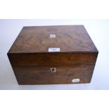 A Victorian travelling dressing case, with plated mounts, in a walnut box,