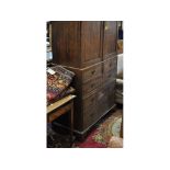 A 19th century oak cupboard on chest,