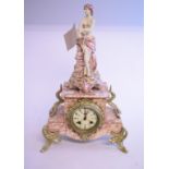 A mantel clock, the marble case applied a seated figure of a lady, 45.