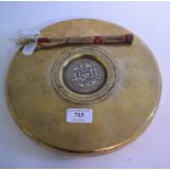 An Islamic gong, 25 cm diameter,