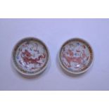 A pair of Chinese porcelain tea bowls, decorated dragons, 6.