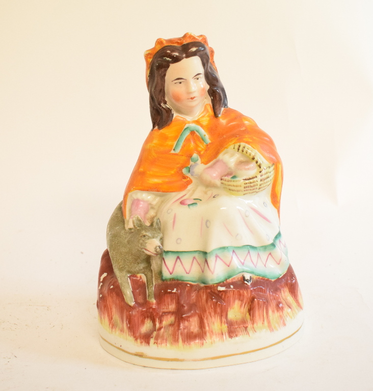 A Staffordshire pottery figure, Little Red Ridinghood, 20.