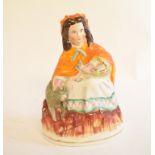 A Staffordshire pottery figure, Little Red Ridinghood, 20.