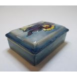 A Moorcroft pottery Columbine box and cover,