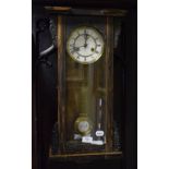 A Vienna style coromandel veneered wall clock, with a Junghans eight day spring wound movement,