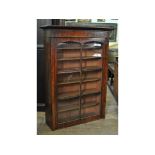 A mahogany bookcase, 84 cm wide, and ano