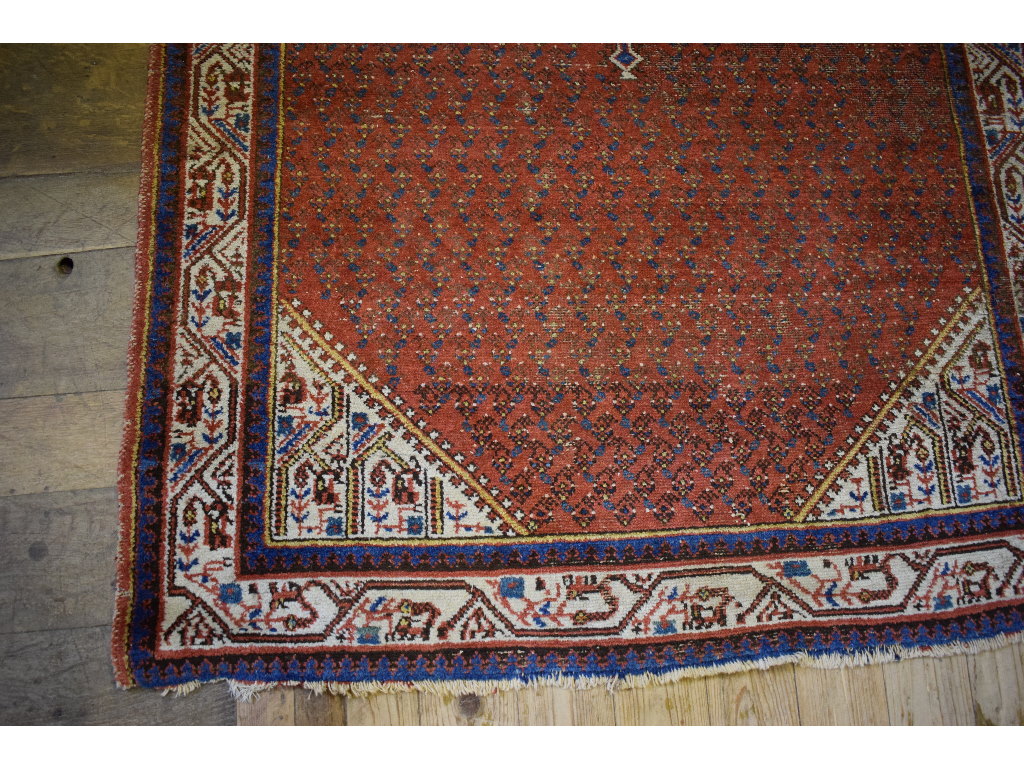 A Persian rug, decorated motifs on a pin - Image 3 of 4