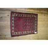 An Afghan rug, 101 x 78 cm, and another