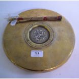 An Islamic gong, 25 cm diameter, with st