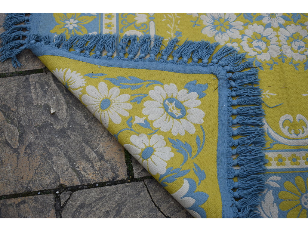 A Belgian quilted rug, decorated floral - Image 2 of 2