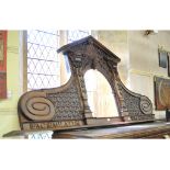 A 17th century style carved overmantel,