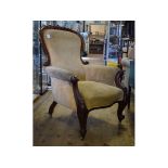 A Victorian carved mahogany armchair, on