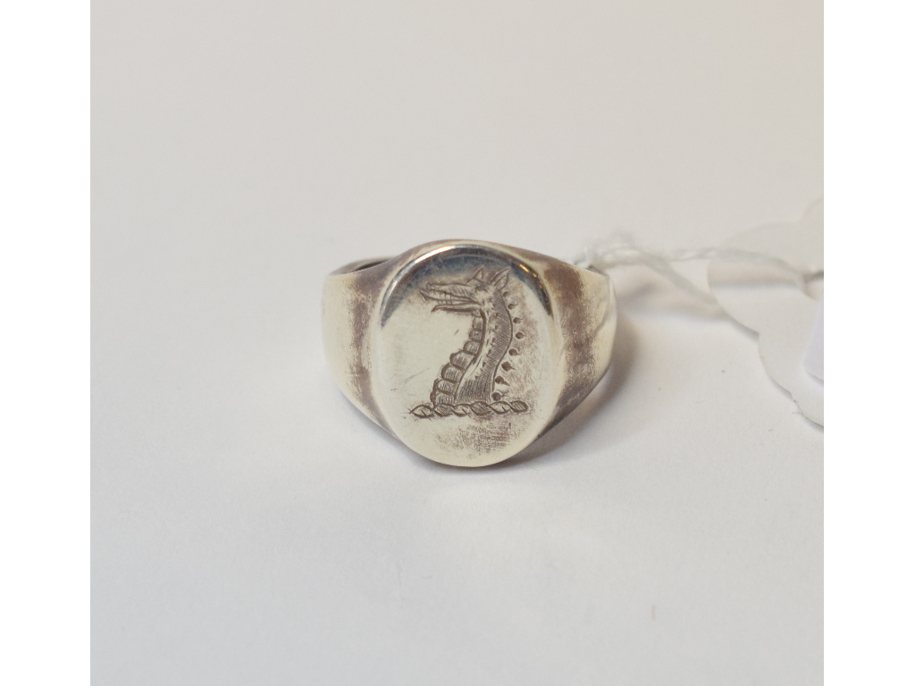 A silver signet ring, approx. ring size