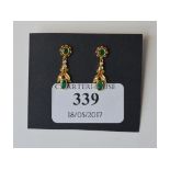 A pair of emerald and diamond drop earri