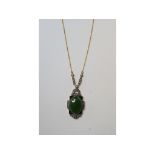 A 9ct gold, jadeite, onyx and diamond ne