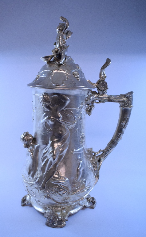 A large plated jug and cover, decorated