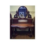 A Victorian walnut Duchess dressing tabl