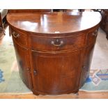 A George III D shaped mahogany side cabinet,