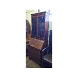 An Edwardian inlaid bureau bookcase, of