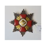 A Masonic silver coloured metal and enamel red cross of Constantine badge,