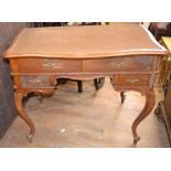 A Continental desk, on cabriole legs, 92