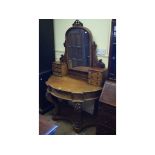 A Victorian mahogany Duchess dressing ta