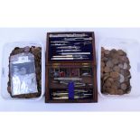 A late 19th/early 20th century geometry set, Chinese ink blocks, various coins,