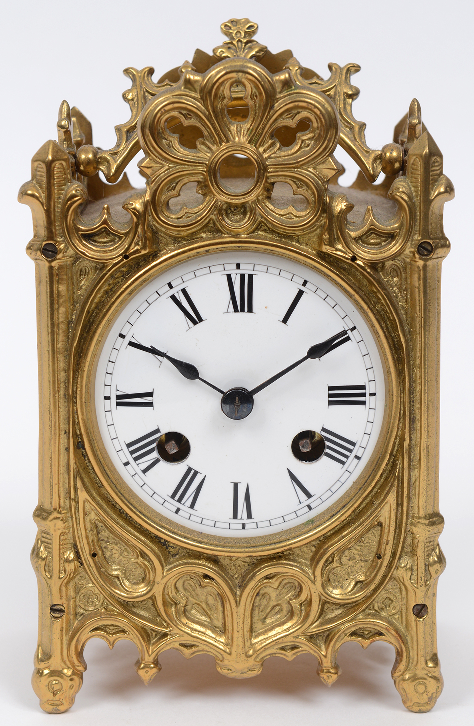 A carriage clock, the 8 cm diameter enamel dial with Roman numerals,