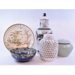 A Japanese Satsuma charger, decorated birds and foliage, signed (cracked), 30 cm diameter,