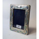 An Art Nouveau style silver and enamel photo frame,