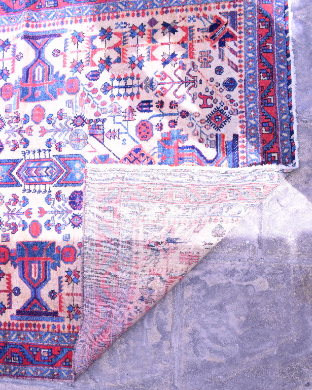 A Persian Afshar Rug, with motifs on a cream ground within a multi border, - Bild 2 aus 3