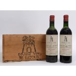 Seven bottles of Chateau Latour Premier Grand Cru Classe, 1958, in a wooden case,