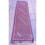 An eastern flat weave runner, decorated geometric motifs within a multi border, 259 x 73 cm,