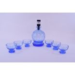 An etched blue glass liqueur decanter, and six matching glasses, a Wedgwood pottery bowl,