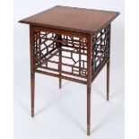 An Anglo-Japanese walnut coffee table, with lattice work side panels,