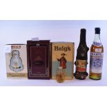 A bottle of Capalan Martell cognac 70° proof, two bottles of Haig's Dimple whisky (one low level),