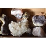 A large section of amethyst quartz crystal, similar crystals and minerals,