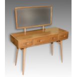 An Ercol elm dressing table, 115 cm wide,