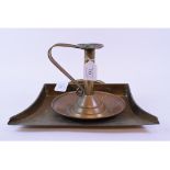 An Arts and Crafts copper chamberstick, 16 cm high,