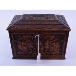 A 19th century oak box, with carved decoration,