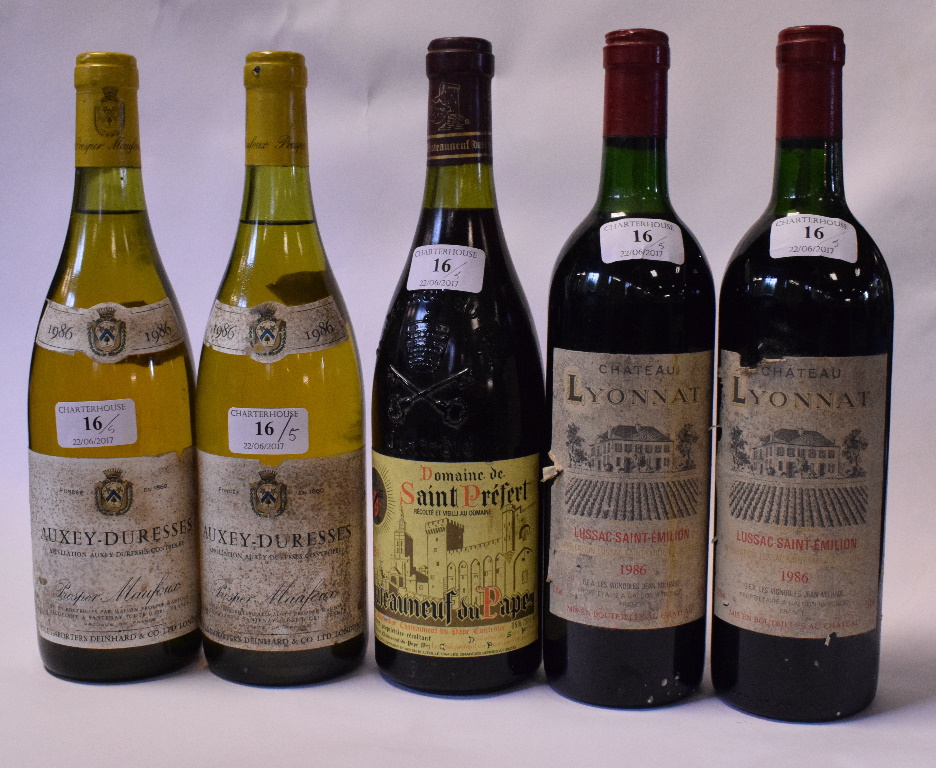 Two bottles of Chateau Lyonnat, 1986, two bottles of Auxey Duresses, 1986,