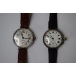 A silver trench style watch,