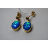 A pair of 9ct gold and Gilson opal drop earrings