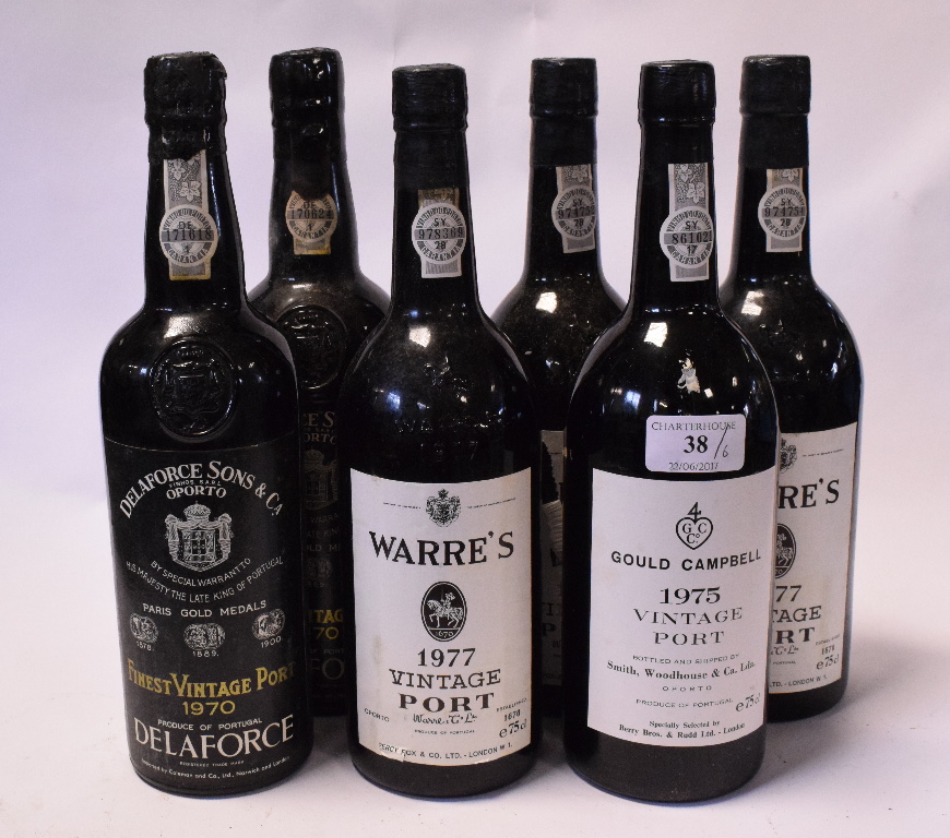 Three bottles of Warre's vintage port, 1970, a bottle of Gould Campbell vintage port 1975,