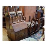 A set of four mahogany dining chairs, with pierced splats, 41 cm wide, a glazed display cabinet,