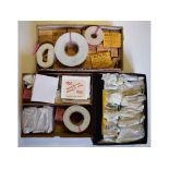 A multi-value roll of stamps, two other similar rolls, all with wax seals, other rolls,