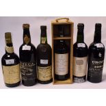 Two bottles of Croft vintage port, 1963, a bottle of Fonseca Guimaraens Reserve vintage port, 1961,