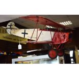 A scratch built model of a German WWI fighter biplane, lacking propeller,