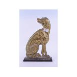 A brass door porter, in the form of a dog, 31 cm high, other metal wares, measuring instruments,