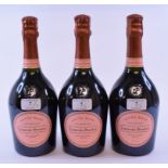 Three bottles of Laurent Perrier Cuvee Rose Champagne,